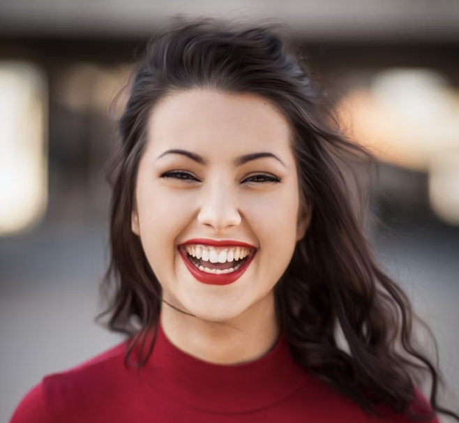 Smiling woman red sweater